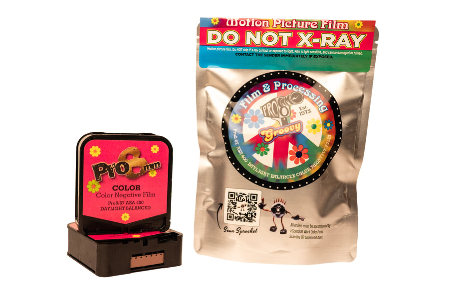 Film packaging with a red label and a black device on a white background